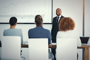 Image showing Business, group and black man with a presentation, finance and feedback with profit growth, planning and review. Corporate training, staff and presenter with financial charts and stock market report