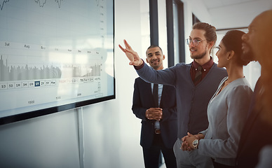 Image showing Business people, group and man with a presentation, screen with charts, financial review or profit growth. Finance, team or presenter with feedback, investment or teamwork with collaboration or deals