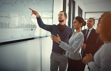 Image showing Business people, finance and man with a presentation, review profit growth and data analysis. Group, presenter or employee with charts for feedback, graphs and explain results for a project and sales