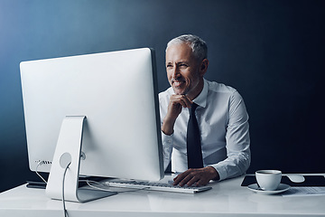 Image showing Computer, thinking and senior business man in office, working on project or mockup. Technology, planning and happy manager at desk for idea, problem solving or reading info for solution in company.