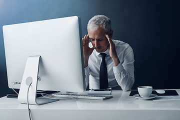 Image showing Mental health, mature businessman with headache and against a studio background at his desk. Burnout or migraine pain, mistake or problem and male person stress for bankruptcy or overworked.