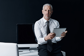 Image showing Tablet, computer and portrait of business man at desk for social media, internet and website in office. Online, corporate and mature male person on digital tech for email, research and planning