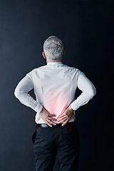 Image showing Elderly business man, back pain and hand for muscle massage, fatigue and stress injury by dark background. Senior executive, ceo and financial advisor with osteoporosis, arthritis and spine problem