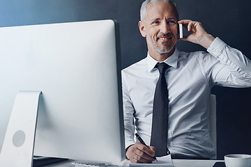 Image showing Online communication, mature businessman on a phone call and against studio background with computer at desk, Happy or connectivity, social networking or crm and male person with smartphone planning