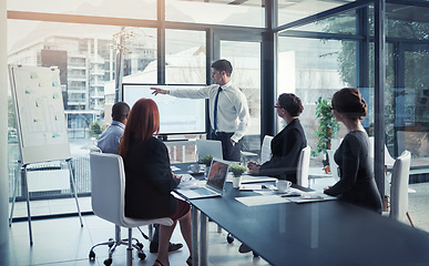 Image showing Presentation, team building and meeting for a development strategy or corporate workshop for sales in a company. Board, manager and business man or speaker talking about growth or negotiation