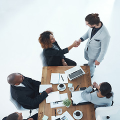 Image showing Handshake, meeting and business people in partnership, b2b onboarding and thank you, success or project deal. Professional woman shaking hands with employee for thanks, welcome or collaboration above