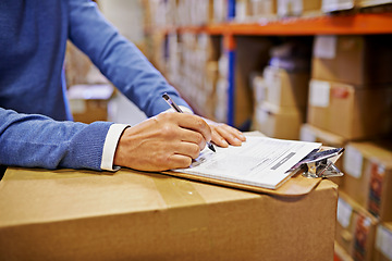 Image showing Hands, sign and clipboard with factory with boxes, clipboard and supply chain warehouse. Delivery, ecommerce and person signature on distribution paperwork, shipping parcel or package with logistics