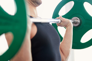 Image showing Man, hands and arm weightlifting in a gym with athlete wellness and healthy from workout. Fitness, bodybuilder and male person with weights power from strong muscle and training at health club