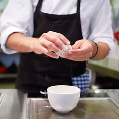 Image showing Hands, chef and cooking food in kitchen for catering, luxury or hospitality. Restaurant, person and cook preparing meal with cup for fine dining, cuisine or gourmet dinner, lunch or dumpling in hotel