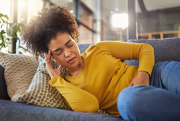 Image showing Stomach pain, digestion and menstruation with woman on sofa for healthcare, endometriosis and tired. Sick, medical and constipation with person in living room at home for nausea, virus and fear