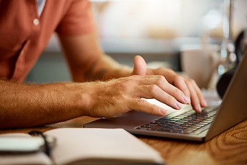 Image showing Man, hands and typing on laptop for email, communication or networking in research on table at home. Closeup hand of male person working on computer for online browsing, chatting or texting in house