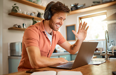 Image showing Wave, laptop and video call with man in kitchen for online meeting, remote work and virtual communication. Happy, hello and social media with person at home for technology, streaming and entrepreneur