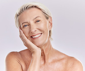 Image showing Portrait, face and beauty with senior woman, happy with skincare and dermatology on white background. Antiaging, natural cosmetics and facial, female model in studio with skin glow and wrinkles