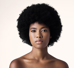 Image showing Beauty, skin care and portrait of black woman with afro, cosmetics and dermatology on white background. Natural skincare, studio and African model with serious face, salon makeup glow and wellness.