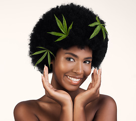 Image showing Black woman, leaves and marijuana in studio portrait, pride and organic skincare by white background. African girl, model or hemp for beauty, makeup or glow on skin for aesthetic, afro and cosmetics