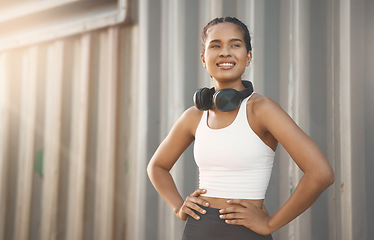 Image showing Fitness, woman with headphones and training with lens flare happy. Exercise or workout, motivation or healthy lifestyle and African female athlete pose in sportswear for health wellness