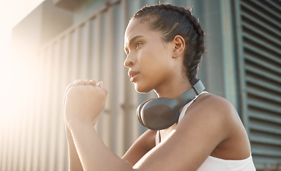 Image showing Fitness, woman with headphones and training with lens flare in the morning. Workout or exercise, warm up in sportswear or healthy lifestyle and female athlete squat for cardio health wellness