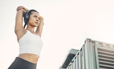 Image showing Exercise, city and woman with headphones, fitness or wellness with training, podcast and stress relief. Female person, runner or girl with headset, streaming music and radio with progress and workout