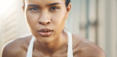 Image showing Face, portrait of a woman and fitness with a lens flare outdoors. Exercise or training, workout or motivation and closeup with African female athlete pose for health wellness or breathing