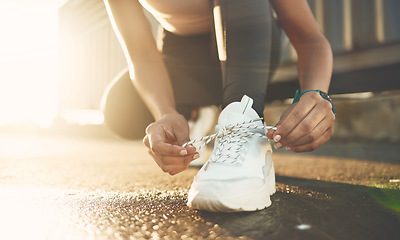 Image showing Tie, street or hands of person with shoelace for fitness training, exercise or running workout on road. Lace, zoom or leg of sports athlete with footwear ready to start exercising on ground in city