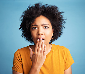 Image showing Surprise, portrait and emoji with woman and expression, shocking news and hand on mouth on blue background. Wow reaction, emotion and female person in studio, alarm and gossip with announcement