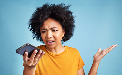 Image showing Confused, phone and african woman isolated on blue background for college doubt, decision or questions. Voice, call and young person or student with what or why hand for mobile problem or choice