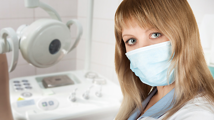 Image showing Female ophthalmologist in protective mask