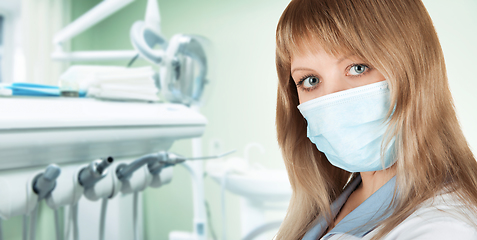 Image showing Female dentist in protective mask