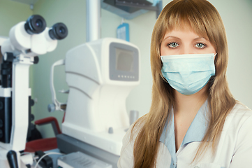 Image showing Female ophthalmologist in protective mask