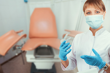 Image showing Female gynecologist in protective mask