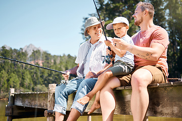 Image showing Man, grandparent and fishing with son in summer on deck for holiday with bonding for weekend. Rod, grandpa and generations with boy at river for adventure with forest to relax as family with smile.