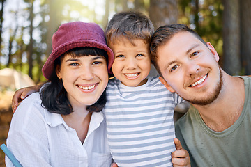 Image showing Happy family, portrait and face in forest for camping vacation, holiday or weekend together in nature. Mother, father and child with smile in the woods for summer getaway, trip or adventure outdoors