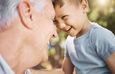 Image showing Children, camp and a grandpa hiking with his grandson outdoor in nature for bonding, travel or adventure together. Kids, face or funny and a little boy laughing with his grandfather on the woods