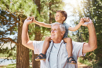 Image showing Happy grandfather, child and back ride in forest for journey or family bonding together outdoors. Grandpa smile carrying kid in piggyback for holiday adventure, travel or trip in nature or woods