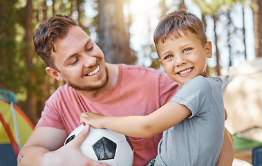 Image showing Soccer, happy and camping with father and son in nature for bonding, playful and sports. Happiness, football and smile with portrait of child and man in forest for adventure, family and support