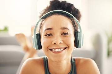 Image showing Happy woman, face and headphones listening to music on floor in yoga for relaxation in living room at home. Portrait smile of female person or yogi with headset for audio streaming, sound or songs