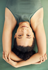 Image showing Happy woman, yoga and lying on mat for exercise, stretching body or workout above at home. Top view portrait of female person, face or yogi in warm up or pose for spiritual wellness or awareness