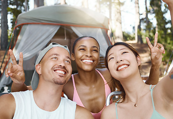 Image showing Smile, peace sign and selfie of friends camping in forest, woods or nature together. Happy, v hand and people taking picture for hiking, social media emoji or group memory outdoor on summer vacation.