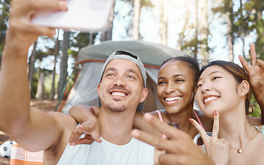 Image showing Happy, peace sign and selfie of friends camping in forest, woods or nature together. Smile, v hand and people taking picture for hiking, social media emoji or group memory outdoor on summer vacation.