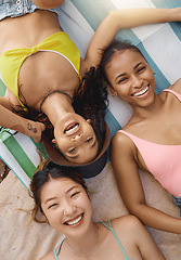 Image showing Friends, portrait and happiness, sunbathing with top view, adventure and diversity, female people have fun together outdoor. Lying down, sun and travel, young women with smile and freedom in summer