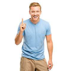 Image showing Happy, pointing up and portrait of a man in studio for announcement, presentation or choice. Male model with hand gesture or sign for advertising, promotion or marketing on a white background