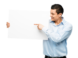 Image showing Smile, pointing and business man with poster in studio isolated on a white background mockup. Happy, banner and professional with space for advertising, marketing or commercial board on promotion.