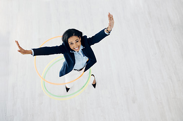 Image showing Happy, hoop and portrait of business woman in office for freedom, motivation and playful. Smile, celebration and creative with female employee from top view for excited, career and mockup space