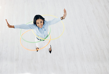 Image showing Energy, hoop and portrait of business woman in office for freedom, motivation and playful. Smile, celebration and creative with female employee from top view for excited, career and mockup space