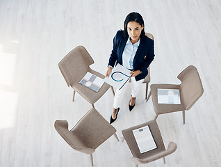 Image showing Business woman, waiting room and documents on chair above for meeting or team appointment at the office. Top view of female person or employee in hiring, paperwork or social group at the workplace