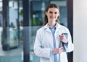 Image showing Tablet, happy woman or portrait of doctor with confidence, technology or empowerment in hospital clinic. Face, confident or proud medical worker smiling with positive mindset or optimism in office