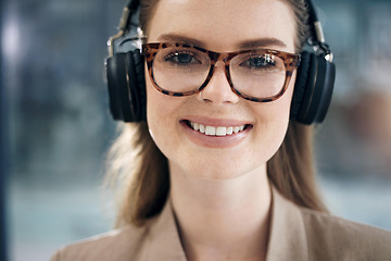 Image showing Happy, music and portrait of business woman in office for streaming, radio and media. Professional, creative and audio with face of person listening to headphones for podcast, online and relax