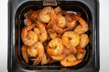 Image showing Pickled shrimp in plastic container