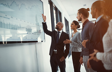 Image showing Teamwork, people in a business meeting and training in a boardroom of their workplace. Data review or strategy, collaboration or planning and coworkers in a workshop for coaching or statistics