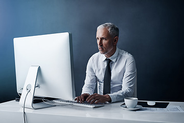 Image showing Office, computer and business man at desk working on online project, planning and writing email. Corporate worker, thinking and mature male person typing on PC monitor for review, website or research